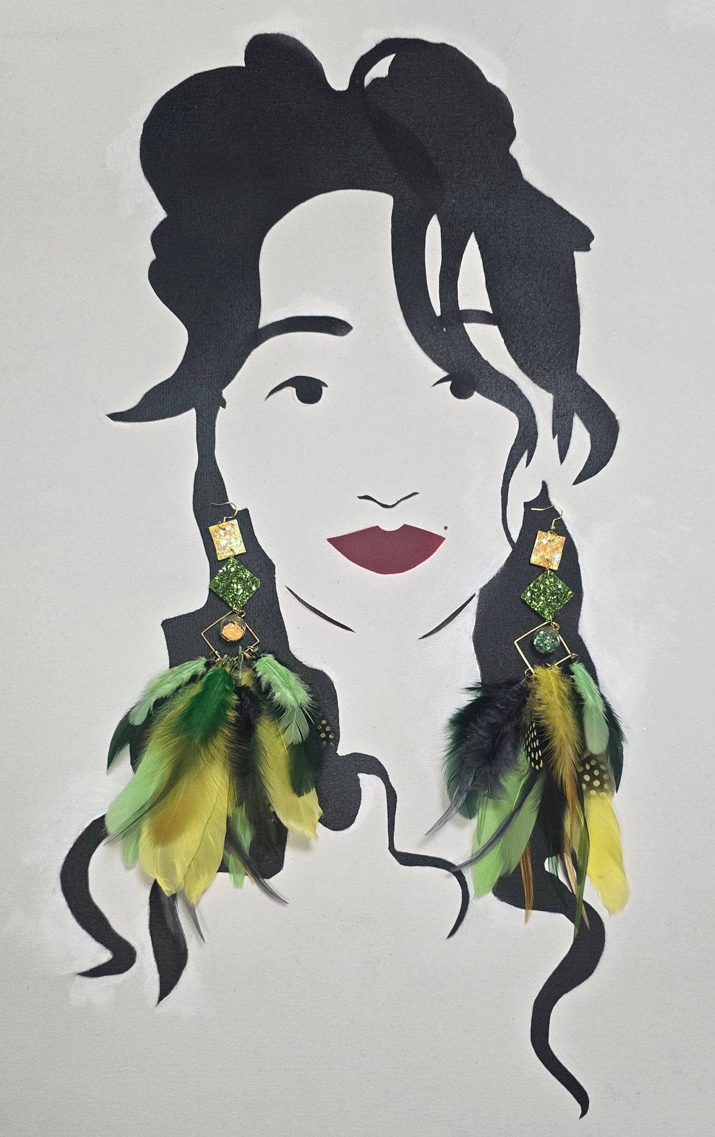 Green boho festival feather earrings by Shop Moxxc, featuring vibrant feathers and intricate details for a stylish look.