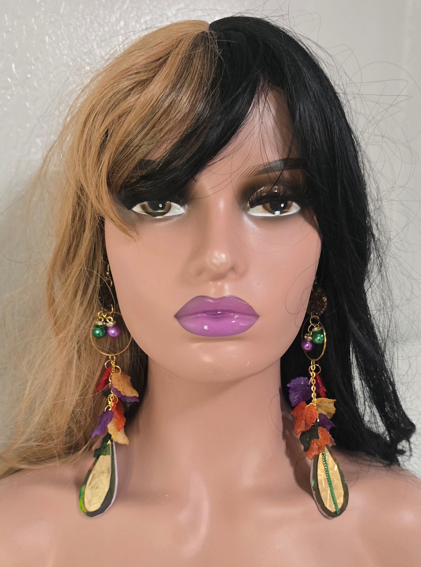 Multicolored gold layered statement earrings by Shop Moxxc featuring vibrant, intricate designs and multiple hanging elements.