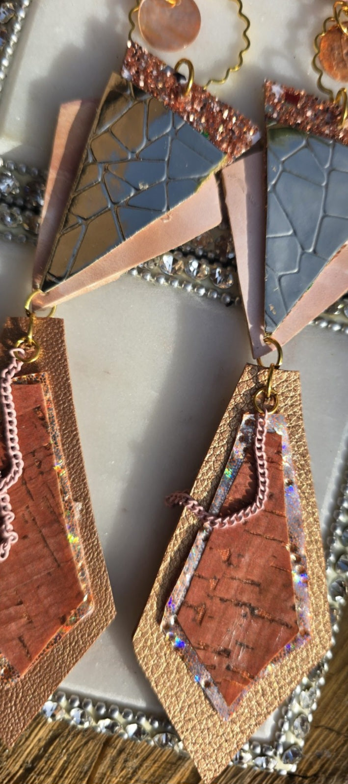Neutral long geometric dangle earrings by Shop Moxxc, featuring a modern design and elegant drop silhouette.