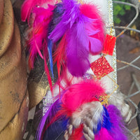 Pink boho festival feather earrings from Shop Moxxc, featuring colorful feathers and intricate design details.