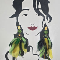 Green boho festival feather earrings by Shop Moxxc, featuring vibrant feathers and intricate details for a stylish look.