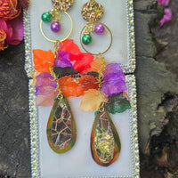 Multicolored gold layered statement earrings by Shop Moxxc featuring vibrant, overlapping gold and multicolor design.