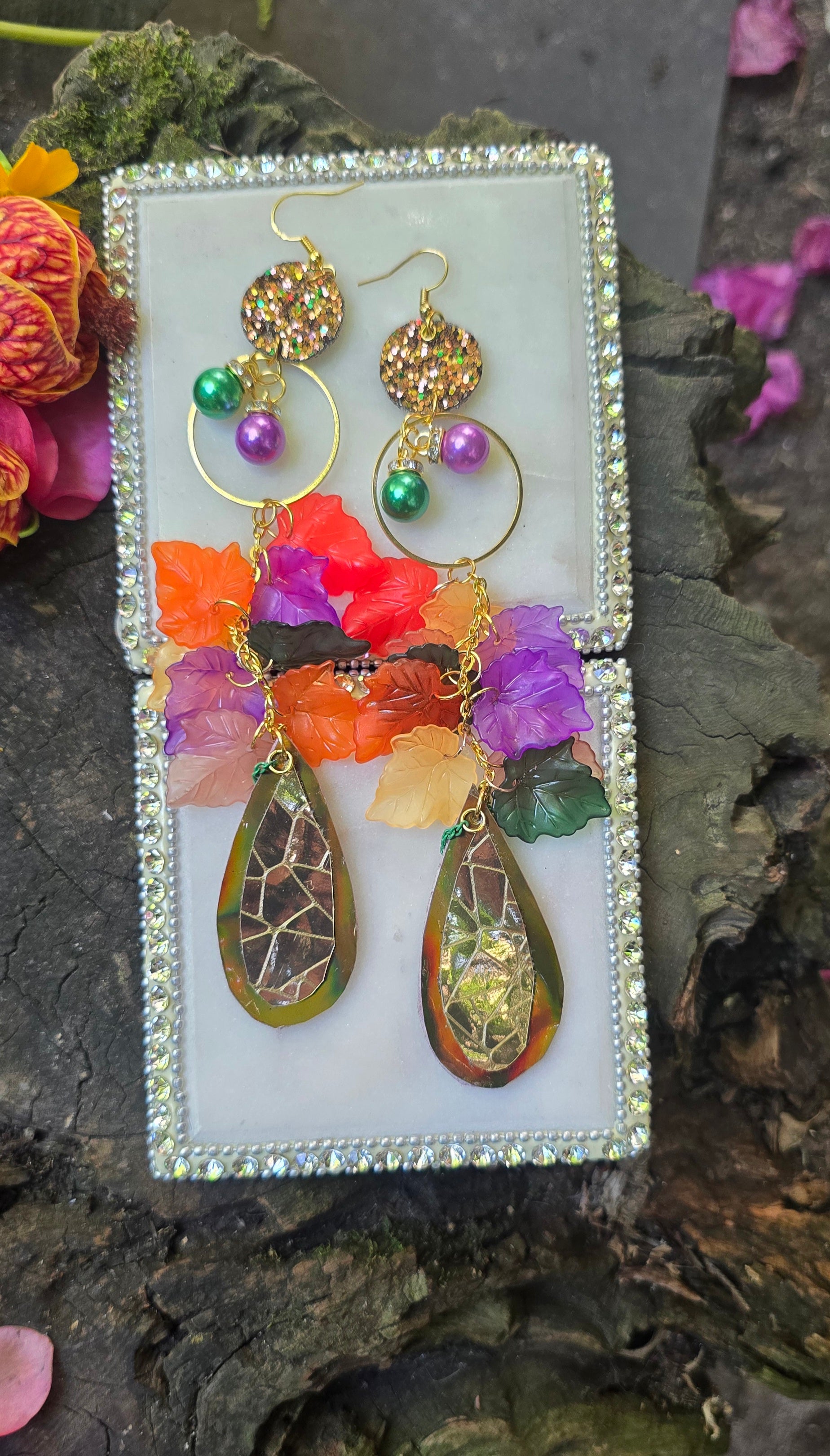 Multicolored gold layered statement earrings by Shop Moxxc featuring vibrant, overlapping gold and multicolor design.