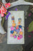 Ivonne orange multicolored round dangle earrings with geometric design, stylish jewelry accessory for women.
