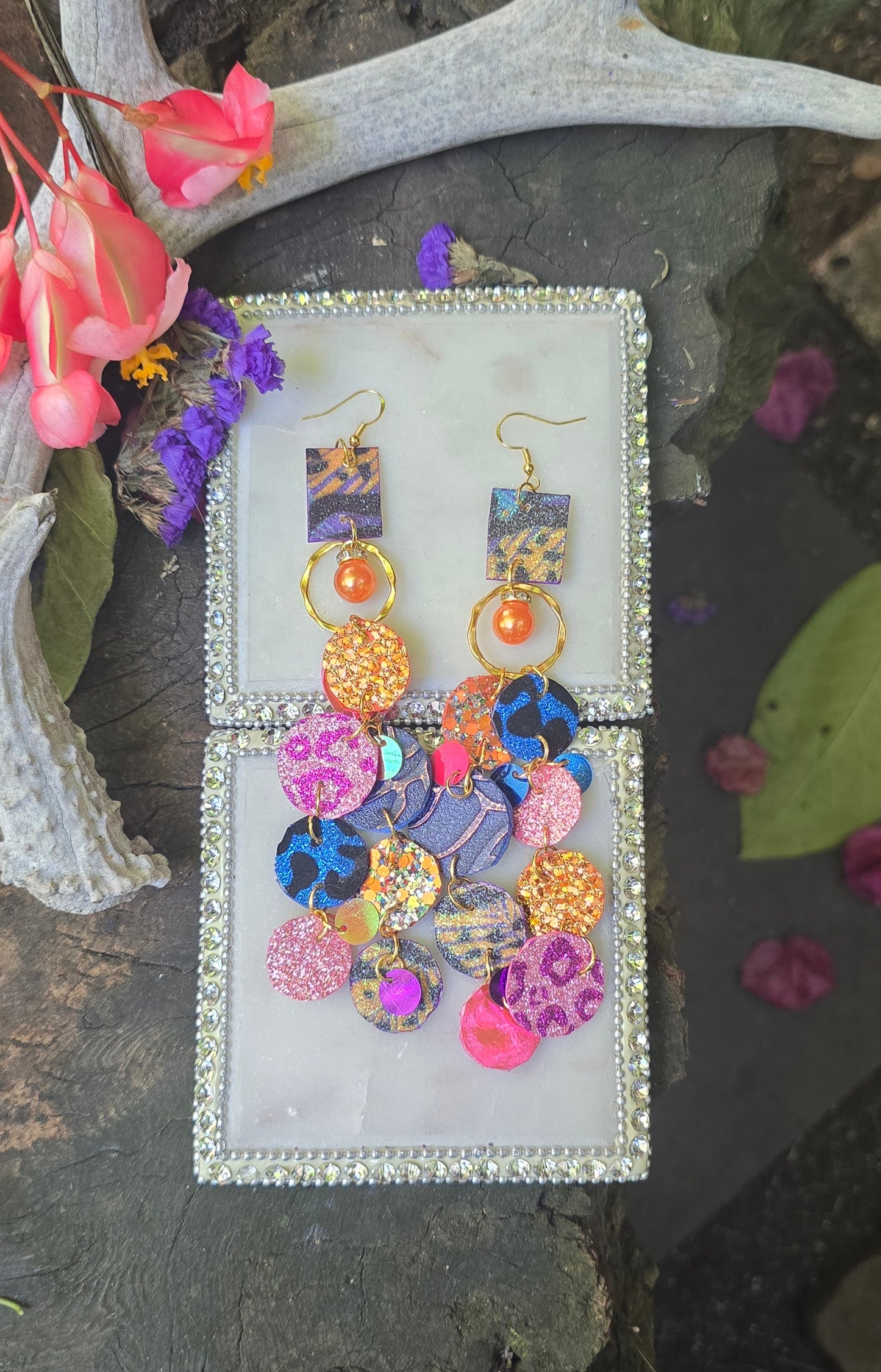 Ivonne orange multicolored round dangle earrings with geometric design, stylish jewelry accessory for women.