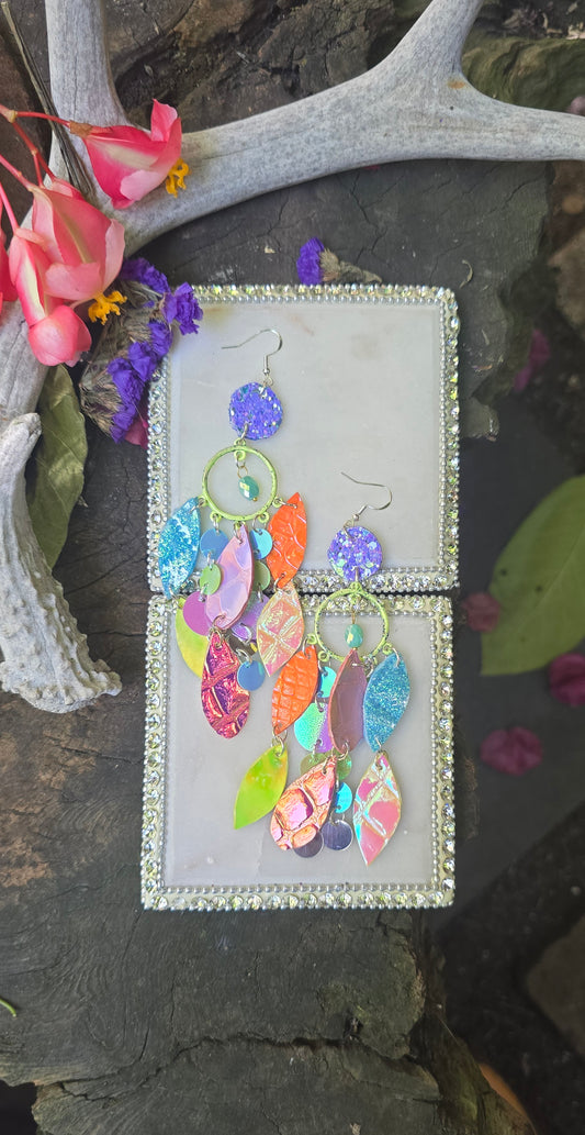 Pastel multicolored layered earrings from the Rosanne collection by Shop Moxxc, featuring vibrant, overlapping geometric shapes.