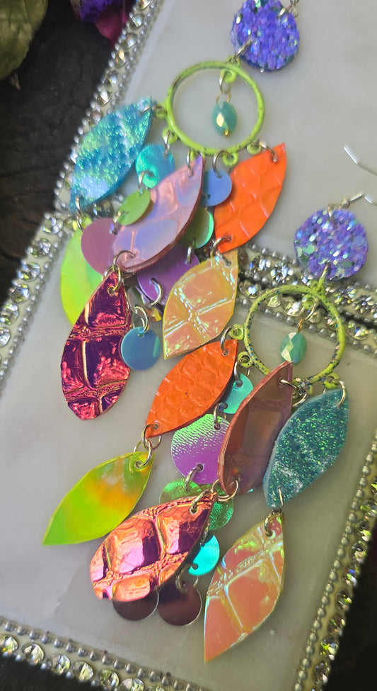 Pastel multicolored layered earrings from the Rosanne collection by Shop Moxxc, featuring vibrant, overlapping geometric shapes.