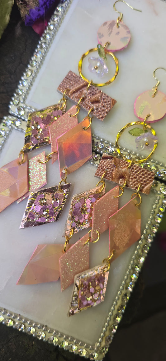 Leslie rose gold geometric chandelier earrings with layered angular shapes, stylish jewelry from Shop Moxxc.