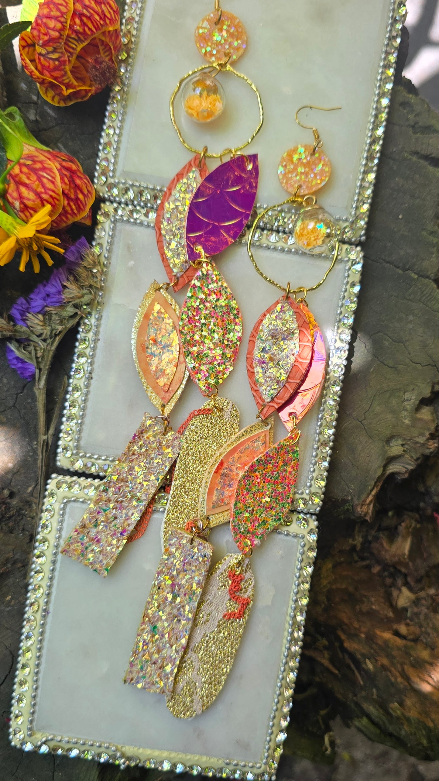 Angelica yellow long statement earrings by Shop Moxxc featuring bold, dangling design with intricate details and vibrant color.