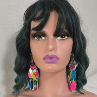 Bright multicolored layered earrings featuring Kathy design, with vibrant overlapping circles in various colors and sizes.