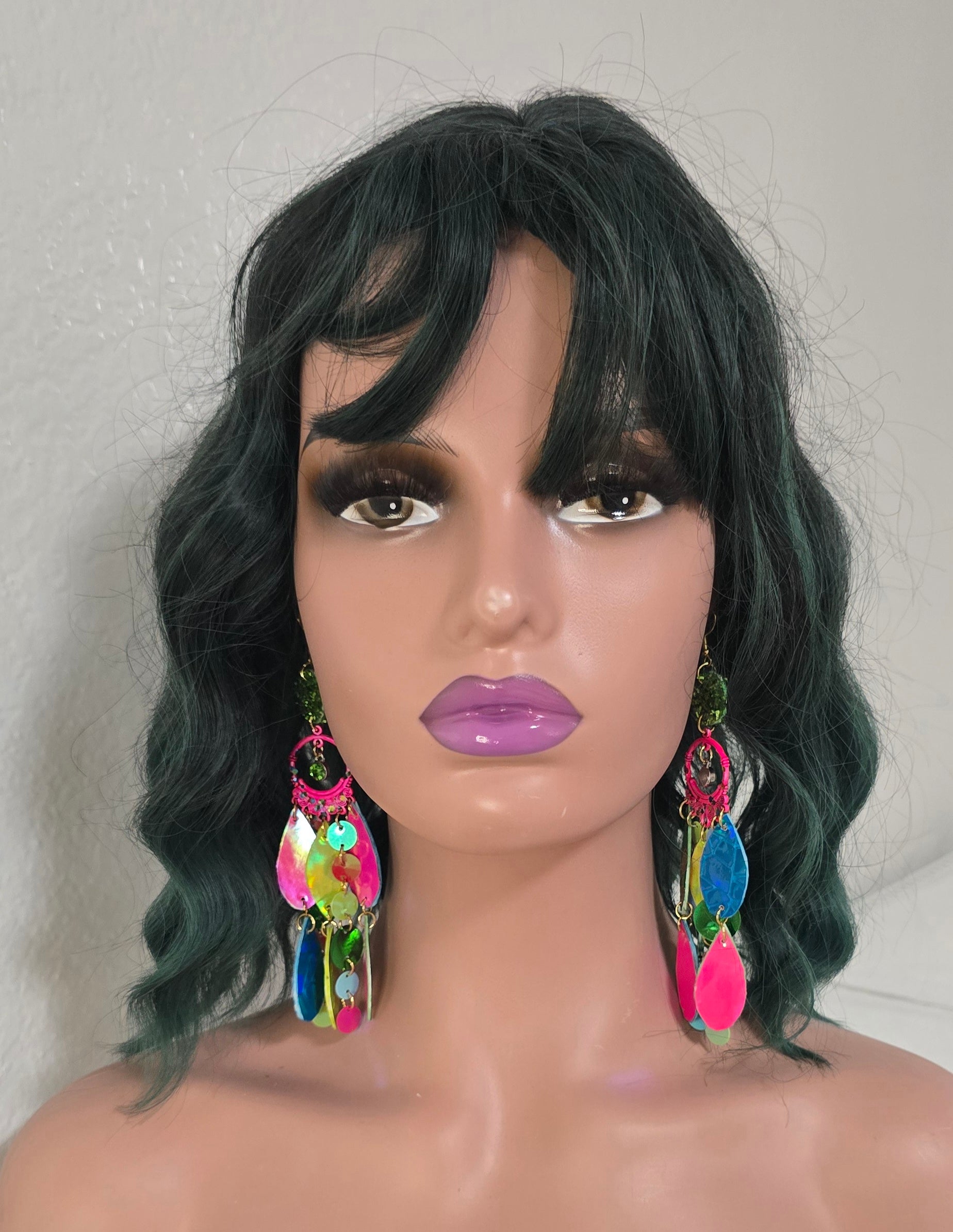 Bright multicolored layered earrings featuring Kathy design, with vibrant overlapping circles in various colors and sizes.