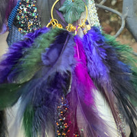 Dark blue feather earrings from the Helen collection by Shop Moxxc, featuring lightweight, delicate feather design.