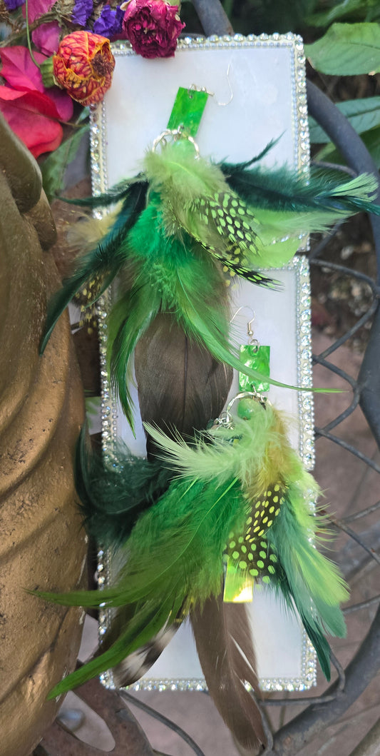 Green feather boho earrings with gold accents, featuring a lightweight, dangling design perfect for casual or bohemian styles.