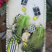 Black and white long dangle earrings from Shop Moxxc featuring elegant, flowing design with intricate details.