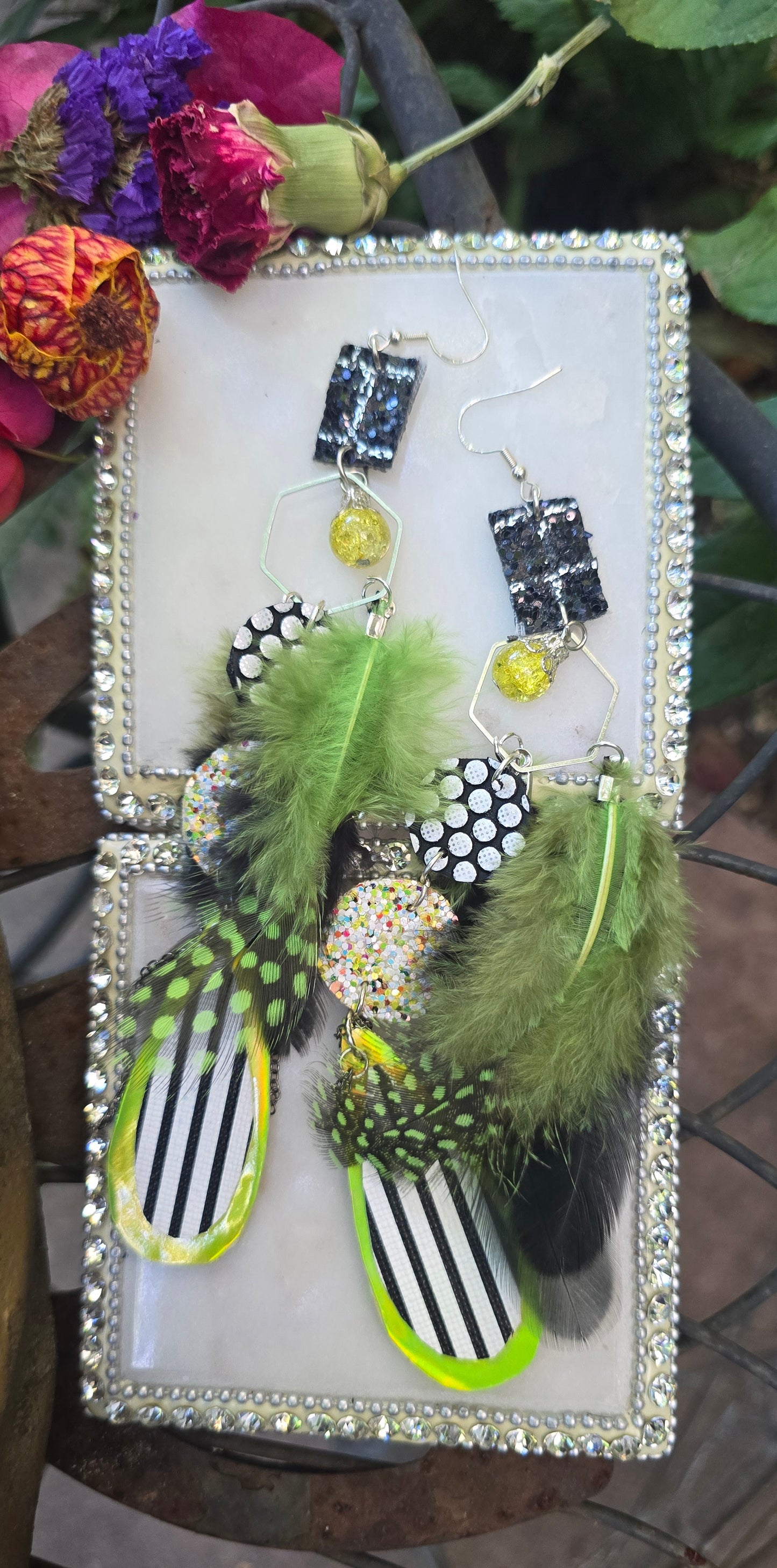 Black and white long dangle earrings from Shop Moxxc featuring elegant, flowing design with intricate details.
